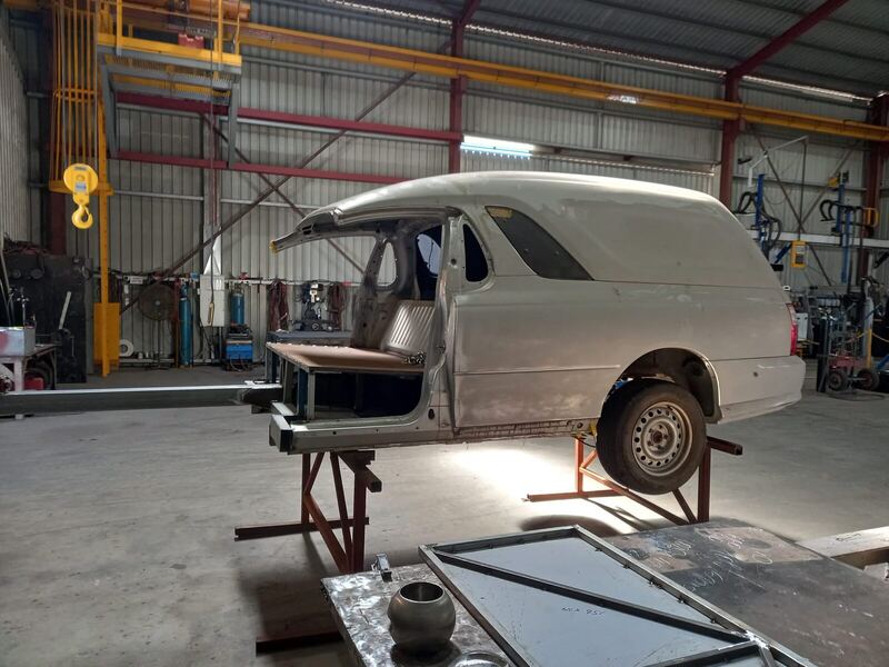 Classic car body stripped back to bare metal