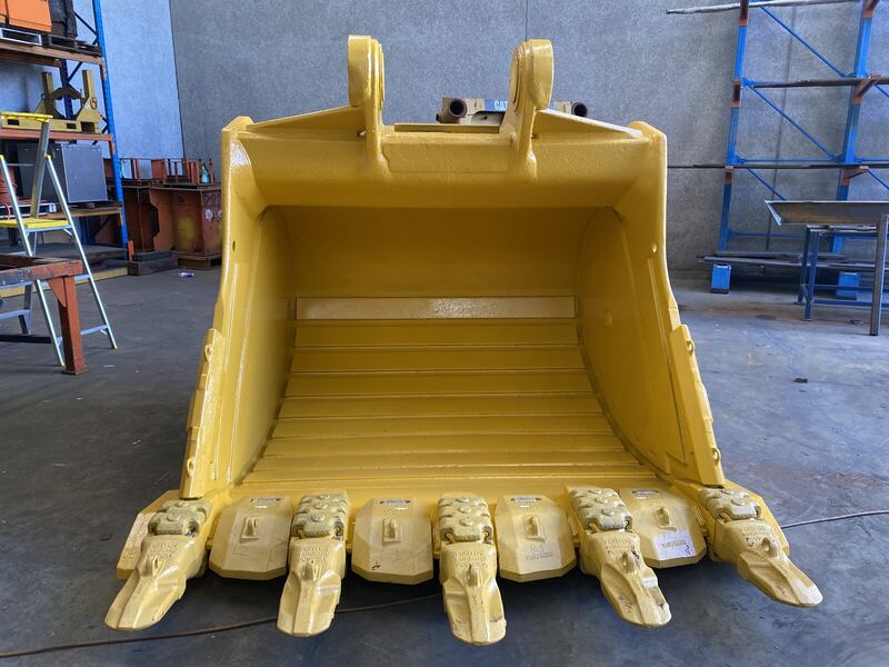 Excavator bucket rebuilt, repainted and fitted with new teeth