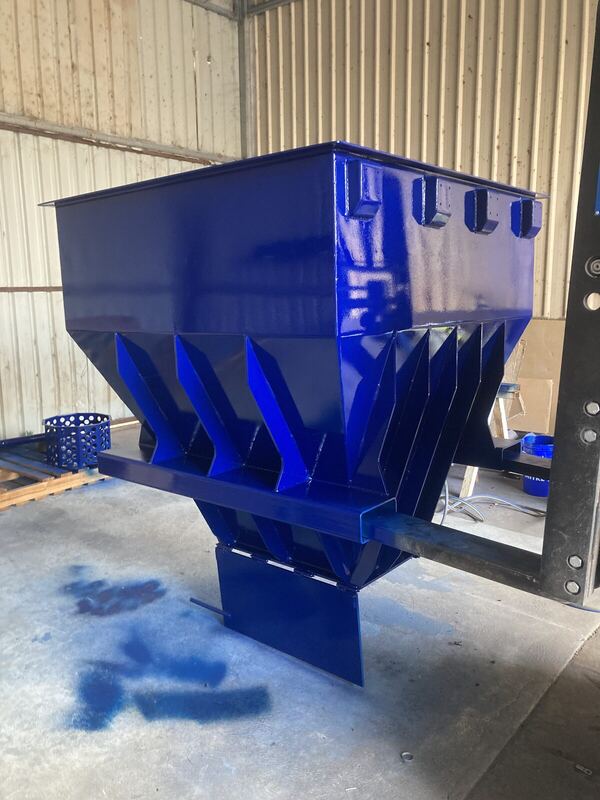 Powder-coated hopper on a fabricated stand