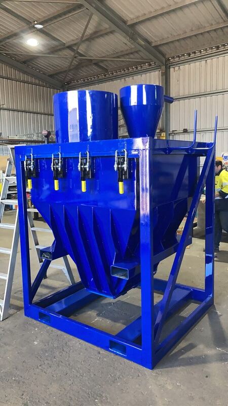 Twin powder-coated hoppers on a fabricated frame